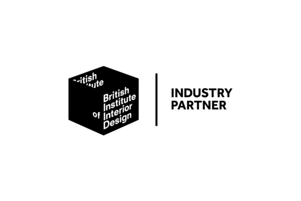 A black geometric logo reads "British Institute of Interior Design" on the left. To its right, text states "INDUSTRY PARTNER" on a white background, separated by a vertical line.